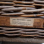 Close up of QBIC Industries sticker on basket