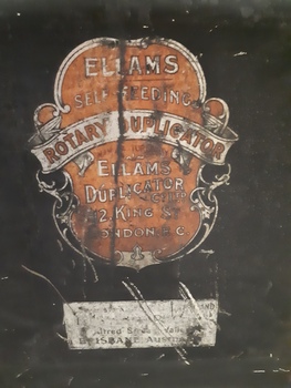 Close up of Ellams logo on black metal case