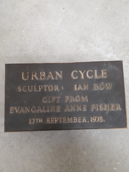 Rectangular metal plaque with raised writing