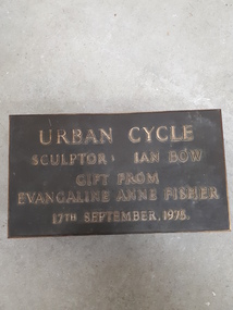 Rectangular metal plaque with raised writing