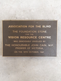 Metal plaque with raised lettering for Vision Resource Centre