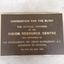 Metal plaque with raised lettering for Vision Resource Centre