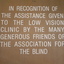 White writing etched into wooden board