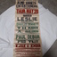 Rectangular paper with red, green and blue lettering
