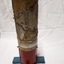 Metal cylindrical map with tactile markers showing Indian Ocean, Western Europe and West Africa