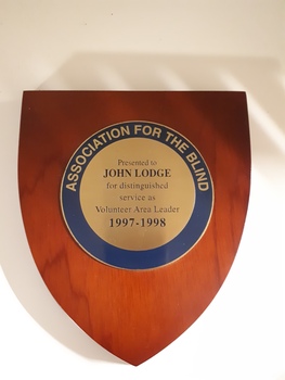 Wooden shield with inscribed metal circle