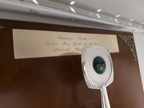 Closer view of top plaque behind topper