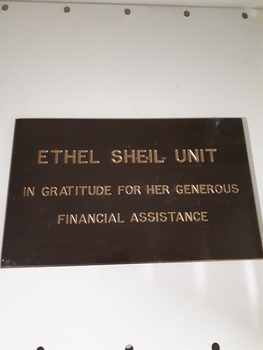 Brown plaque writing bronze raised writing