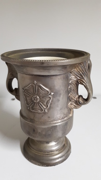 Silver candle holder with embellished detail