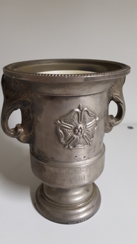 Silver candle holder with embellished detail