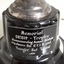 Black plate at base of trophy with white writing