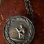 Kneeling rifleman surrounded by wreaths and a Canadian beaver on reverse side of coin