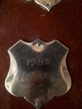Winner's name inscribed on nameplate