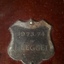 Winner's name inscribed on nameplate