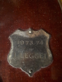 Winner's name inscribed on nameplate