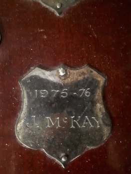 Winner's name inscribed on nameplate