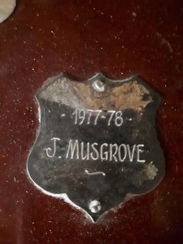 Winner's name inscribed on nameplate