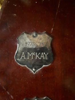 Winner's name inscribed on nameplate