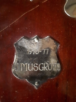 Winner's name inscribed on nameplate