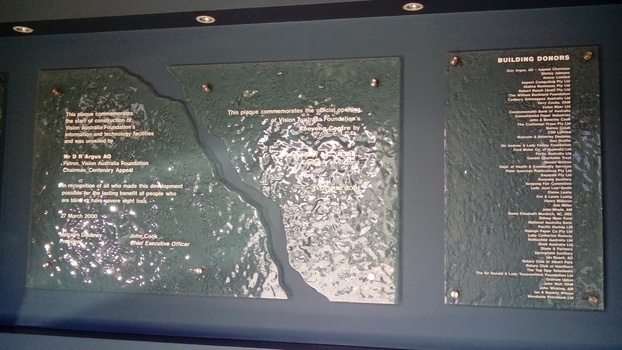 Stippled glass plaque with wording and names