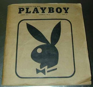 Brown paper cover with title at top and bunny wearing a bow tie