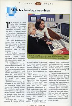 Haido Skliris shows Nan Swanston the latest computer technology at Kooyong.