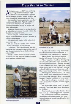 Christine Reed with goats and near a paddock gate at her farm in Gippsland.