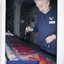Brenda Hutchinson-Brooks painting silk scarves.