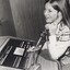 Female working on a switchboard