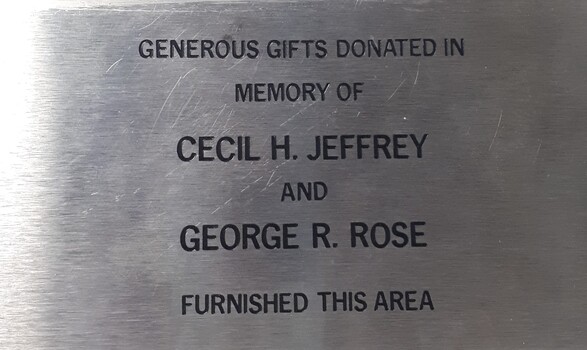 Metal plaque with dedication inscription