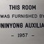 Metal plaque with dedication inscription