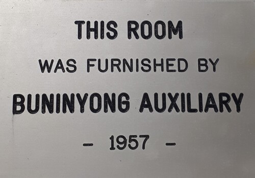 Metal plaque with dedication inscription