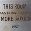 Metal plaque with dedication inscription