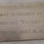 Metal plaque with dedication inscription