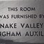 Metal plaque with dedication inscription
