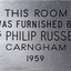 Metal plaque with dedication inscription