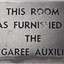 Metal plaque with dedication inscription