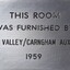Metal plaque with dedication inscription