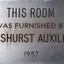 Metal plaque with dedication inscription