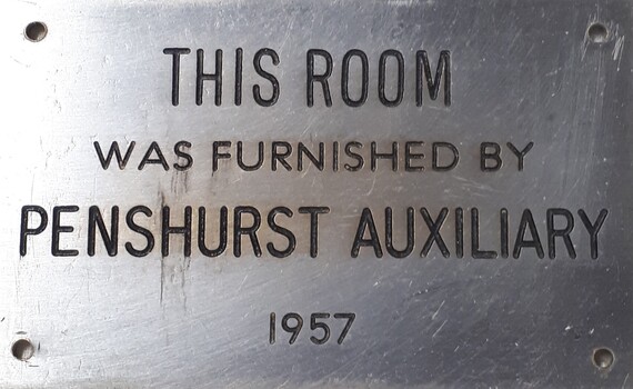 Metal plaque with dedication inscription