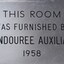 Metal plaque with dedication inscription