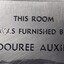 Metal plaque with dedication inscription