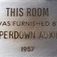 Metal plaque with dedication inscription