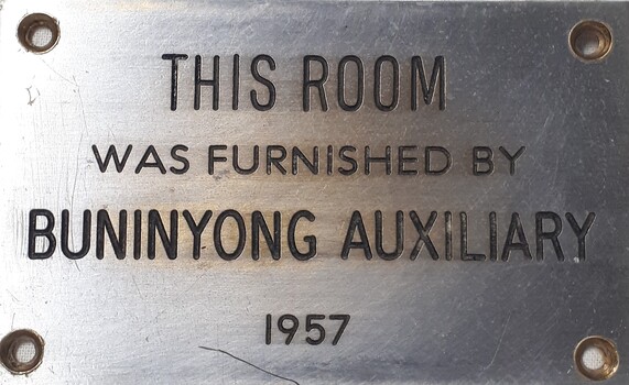 Metal plaque with dedication inscription