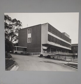 Three storey building with ramps and balconies