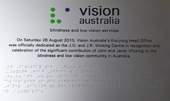 Black writing on silver background with Vision Australia at top