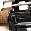 Cork holding paper in place on black metal typewriter