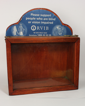 Wooden square with plastic wall and signboard