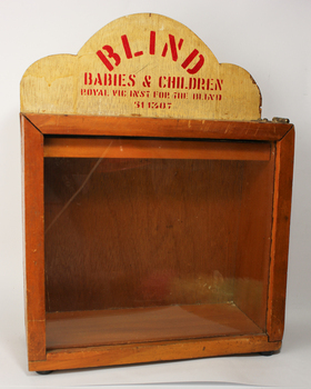 Wooden square with plastic wall and signboard
