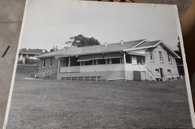 Single story building with raised platform 